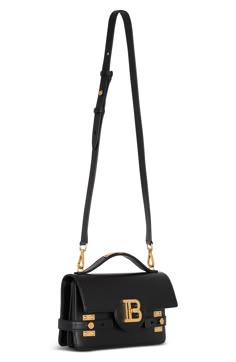 Gleaming hardware—a hallmark of Balmain designs—enhances the polished look and versatile functionality of this top-handle bag that converts to a crossbody. Turnlock flap closure Top carry handle; removable, adjustable crossbody strap Dual interior compartments; card slot Structured silhouette with flat base for stability Leather Made in Italy Designer Handbags Modern Satchel With Logo Hardware And Double Handle, Modern Double Handle Satchel With Logo Hardware, Black Flap Bag With Logo Hardware For Everyday Use, Black Satchel With Logo Hardware And Double Handle, Classic Rectangular Satchel With Logo Hardware, Classic Rectangular Flap Bag With Logo Hardware, Modern Crossbody Flap Bag With Logo Hardware, Black Double Handle Satchel With Logo Hardware, Black Rectangular Flap Bag With Logo Hardware