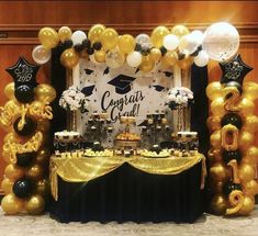 a graduation party with balloons and decorations