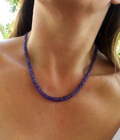 "Genuine Tanzanite stone 14k gold necklace. Natural Periwinkle tanzanites jewelry. Blue purple tanzanite. September birthstone. Gemstone necklace. Natural blue Tanzanite stone graduating necklace. Faceted, periwinkle stones range from 3 to 6 mm. Total weight of the stones is about 70 carats. Standard Length 18 inches as on a model, plus 2\" extender, so total length is 20 inches long. I have matching earrings in my shop, https://www.etsy.com/listing/186310204/tanzanite-pave-chandeliers-earrings, Tanzanite Faceted Necklace For Gift, Sapphire Rondelle Jewelry Gift, Sapphire Rondelle Jewelry For Gift, Gift Tanzanite Faceted Necklace, Sapphire Tanzanite Birthstone Necklaces, Tanzanite Briolette Necklace Gift, Briolette Tanzanite Necklace For Gift, Faceted Tanzanite Jewelry For Gifts, Faceted Tanzanite Jewelry Gift