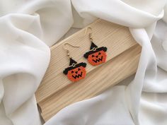 ➙Embrace the enchantment of Halloween with these handcrafted pumpkin earrings! Each meticulously designed and handcrafted pair captures the essence of the season, making them the perfect choice for Halloween parties, costume events, or simply immersing yourself in the spirit of the season.♥︎ ➙Key Features: - Handcrafted with precision using high-quality Miyuki beads. - Unique pumpkin designs that exude Halloween vibes. - Lightweight and comfortable for all-day wear. - Versatile, suitable for bot Halloween Beaded Earrings Patterns Free, Pumpkin Beaded Earrings, Handmade Spooky Earrings For Gift, Handmade Witchy Earrings For Halloween, Halloween Beaded Dangle Earrings Gift, Halloween Gift Beaded Dangle Earrings, Spooky Handmade Earrings For Halloween, Handmade Spooky Halloween Earrings, Spooky Handmade Halloween Earrings