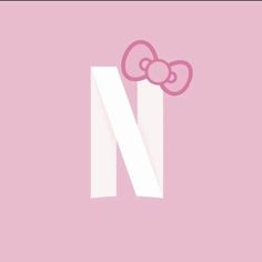 the letter n with a bow on it's head is shown in pink and white