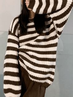 ⚡Buy 2023 Cozy Striped Pullover Sweater Black ONE SIZE under $38.00 in Sweaters at AnotherChill.com Online. Style: Casual/Street/Vintage/Sweet/Preppy. Fabric Content: Polyester Blend. Fit Type: Loose fit. Neckline: Crew Neck. Sleeve Length: Long Sleeve. : Stay effortlessly stylish this fall with our Cozy Striped Pullover Sweater. Crafted from a soft and warm polyester blend, this sweater offers a loose fit for ultimate comfort. The classic crew neck and long sleeves make it a versatile piece for Preppy Fabric, Striped Knitwear, Style Désinvolte Chic, Style Casual Chic, Vintage Knitwear, Casual Chique, Striped Pullover, Preppy Look, Top Streetwear