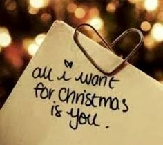 a piece of paper with the words all i want for christmas is you written on it