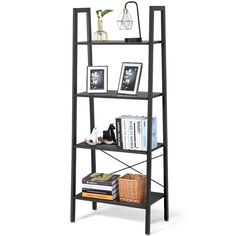 a bookshelf with three shelves and pictures on the top one shelf is black