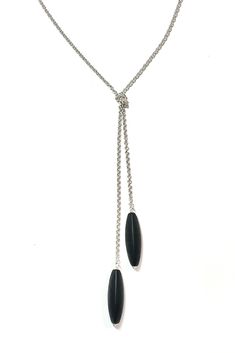 Silver Necklace - Sleek three-sided black onyx drops accent the ends of this elegant sterling silver lariat necklace. The versatile silhouette knots at the front, making it easy to change the length and effect. Ring clasp.<br><br><b>Dimensions:</b><br>Onyx: 1.5L, 0.48W<br>Chain: 36L, 39 drop Silver Lariat Necklace, Lariat Necklace Silver, Artful Home, Lariat Necklace, Nyx, Black Onyx, Precious Metals, Onyx, Silver Necklace