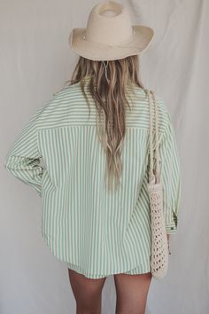 Green and yellow striped long sleeve button up collared top Material is Polyester Lay flat to dry Model is 5'9 wearing a small SHOP THE LOOK Small Medium Large Length 28" 29" 30" Bust 23.5" 24.5" 25.5" Spring Collared Tops With Contrast Stripes, Spring Long Sleeve Shirt With Striped Collar, Striped Shirt With Button Closure For Spring, Spring Striped Shirt With Button Closure, Striped Button Closure Shirt For Day Out, Striped Shirt With Button Closure For Day Out, Spring Collared Top With Contrast Stripes, Striped Long Sleeve Shirt For Spring, Spring Long Sleeve Tops With Vertical Stripes