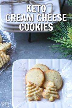 keto cream cheese cookies on a white plate with pine branches in the background and text overlay