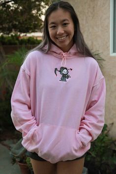 ✰Embroidered✰UNISEX✰Hand drawn and designed✰50% cotton, 50% polyester✰Super soft and comfy!✰Model is 5'5 and wearing Size L in an Pink Hoodie Matching Hoodies, Custom Matches, College Hoodies, Embroidery Sweatshirt, Grim Reaper, Pink Hoodie, Custom Embroidery, Quarter Zip, Hand Drawn