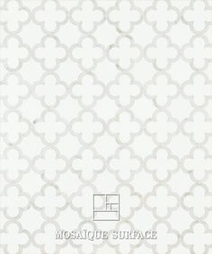 a white wallpaper with an intricate design