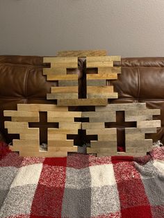 the wooden blocks are stacked on top of each other in order to make it look like they have been made out of wood