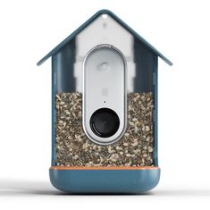 an image of a bird feeder with birdseed in it