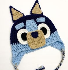 a crocheted hat with an animal face on it