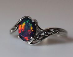 This Anniversary Rings item by KissedByFireJewelry has 3030 favorites from Etsy shoppers. Ships from Hollywood, FL. Listed on Sep 28, 2023 Fire Opal Engagement Ring, Black Fire Opal, Opal Ring Vintage, Vintage Silver Jewelry, Black Opal Ring, Cute Engagement Rings, Opal Wedding Rings, Fire Opal Ring, Black Fire