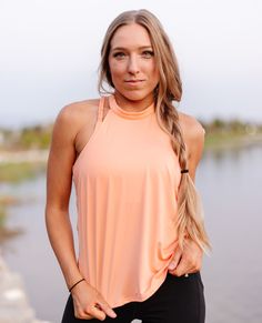 The Peach Tie Back Halter is ready for whenever you are. Made with polyester-spandex blend fabric, it's lightweight and breathable. Cut with high halter top neckline and a cute wrap around in the back, style is at the heart of this sweet and sporty tank. 🍑 Athleisure Top With Built-in Bra And Halter Neck, Summer Tank Top With Built-in Bra For Light Exercise, Sleeveless Halter Top With Built-in Bra For Workout, Casual Activewear With Built-in Bra And Halter Neck, Summer T-back Halter Top For Gym, Summer Tops With Built-in Bra For Workout, Versatile Halter Neck Tank Top For Beach, Summer Gym T-back Tops, 4-way Stretch Summer Workout Tank Top