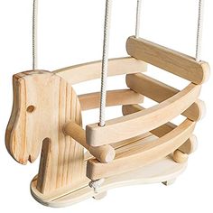 a wooden rocking horse on a white background