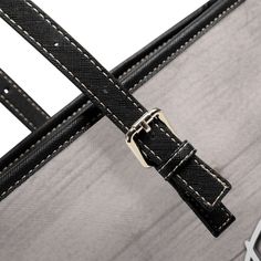 a close up of a piece of luggage with straps on it's sides and an empty space in the middle