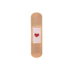 a red heart is placed on the back of a skateboard with white and brown trim