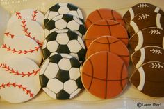 decorated cookies in the shape of sports balls