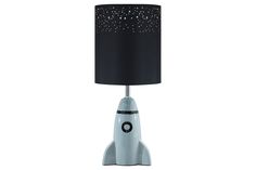 a table lamp with a black shade on top and a white rocket ship design underneath