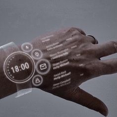 a person's hand with an electronic interface on it