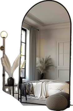 a bedroom with a large mirror on the wall