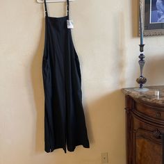 Fabulous Brand New With Tags Wide Leg Jumpsuit. Adjustable Straps, Wide Leg, And Split Hem On Bottom For Cute Detail. Bnwt. Lightweight For Easy Wear. Black Overall Jumpsuits And Rompers With Pockets, Black Full-length Jumpsuits And Rompers For Night Out, Black Full-length Jumpsuits For Night Out, Full-length Black Jumpsuits For Night Out, Full Length Black Jumpsuits For Night Out, Black Bib Front Jumpsuit For Summer, Black Bib Front Jumpsuits And Rompers For Summer, Black Summer Jumpsuits And Rompers With Bib Front, Black Summer Jumpsuit With Bib Front