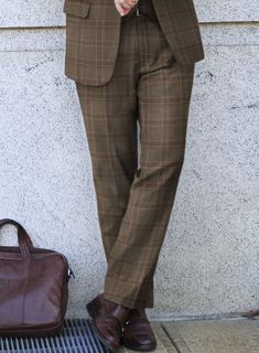 Make a bold statement and let your style speak volumes with our London Loom Brown Check Wool Silk Linen Pants. Expertly tailored from a premium wool blend, it features a striking plaid design in brown with a touch of wine, creating a unique and eye-catching appearance. The fabric guarantees maximum comfort while maintaining elegance, allowing you to confidently shine at any event. Whether attending a wedding, stepping out for a formal day, or simply showcasing your fashion sense, these pants exemplify sophisticated charm in your wardrobe.  The London Loom Collection  masterfully blends the durability of wool, the luxury of silk, and the breathability of linen, reflecting the elegance of English tailoring. This fabric offers season-spanning comfort, refined drapes, and natural coolness. Wov Italian Suit, Silk Linen, Linen Suit, Plaid Design, Wool Suit, Double Breasted Suit, The London, Linen Pants, Fabric Samples