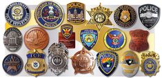 the police badges are all different colors and sizes, but there is no image to describe