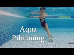 a woman in a swimming suit is under the water with words above her that read aqua pilatomiing