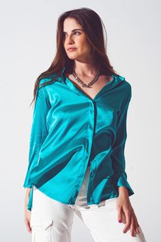 Step up your wardrobe with the stunning Satin Shirt with Split Cuff in Turquoise from Szua Store. Crafted from a blend of 55% rayon, 43% viscose, and 3% spandex, this satin shirt offers a relaxed fit perfect for any party. Model is wearing size S, with measurements 33-24-35 and a height of 5'8''. Running true to size, this full-length shirt features a wide collar neckline, long sleeves, and unique split cuffs. The button placket adds a polished touch to this luxurious satin shirt. Shop the Satin Statement Shirt, Satin Shirt, How To Apply Makeup, Pet Hair, Party Fashion, Belted Dress, High Waisted Pants, Hat Hairstyles, Alternative Fashion