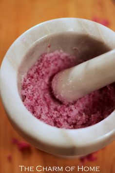 a white mortar bowl filled with pink stuff