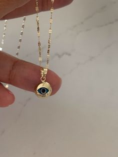 14K Evil Eye on Yellow Gold Mirror Chain, Gold Chain, 1.7mm Twisted Diamond Cut Mirror Chain, Shiny Dual Mirror, Evil Eye Pendant -----------------------------------------------------------------------------------------------The Mirror Necklace with the Evil Eye pendant, is dainty and modern. It can help dress up any wardrobe and is a comfortable length for wear. If you are looking for a gift for a dear loved one, think of this Necklace - we can help you get it in time for any special event.♦ Ma Evil Eye Gold Necklace, Protection Charms, Mirror Necklace, Hamsa Evil Eye, Round Star, Solid Gold Charms, Gold Charms, Blue Evil Eye, Eye Pendant