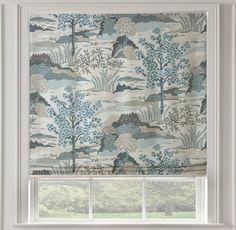 a window with a blue and white wallpaper on it