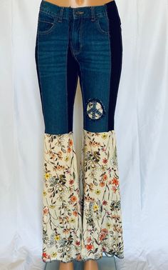 The most comfortable jeans you'll ever wear. One of a kind jeans with the Mama Mia ruffle will turn heads. Comfort and funky hippie style. Embellished with denim peace sign. These get noticed. SIZE XXS-L. You will need to size down. XXS - 0-4 XS-6-8 S- 8-12 M-12-14 L-16-18 Hippie Denim Bottoms For Fall, Cotton Hippie Flare Jeans For Spring, Hippie Wide Leg Jeans For Fall, Bohemian Denim Flare Jeans For Fall, Bohemian Flare Denim Jeans For Fall, Bohemian Dark Wash Jeans For Fall, Fitted Denim Hippie Bottoms, Hippie Fitted Denim Bottoms, Bohemian Medium Wash Flare Jeans For Fall