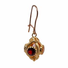 This is part of Chairish’s Fine Jewelry assortment.  Fine pair of Victorian Etruscan style dangle pierced earrings. The earrings are in charm form, set with 4 semi-precious stones which include citrine, aquamarine, amethyst, and garnet. The bezels have Etruscan style beadwork and filigree finials at the bottom. The earrings have French wires and hooks for pierced ears. The earrings test 14K but have no marks. Condition is excellent.   Dimensions- Length including wires: 1 1/2”; Width: 1/2”; Weig Ornate Gemstone Dangle Earrings, Luxury Jeweled Dangle Jewelry, Luxury Jeweled Drop Earrings, Gold Jeweled Fine Jewelry Earrings, Byzantine Style Pierced Drop Earrings, Ornate Jeweled Drop Earrings, Yellow Gold Jeweled Drop Earrings, Luxury Jeweled Earrings Gift, Yellow Gold Gemstone Pendant Earrings