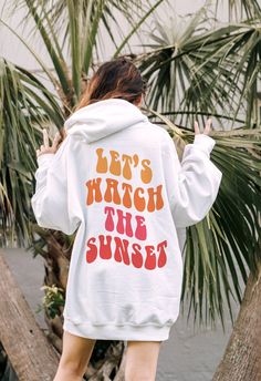 Let's Watch The Sunset Hoodie Trendy Hoodie Aesthetic Sweatshirt Preppy Sweatshirt Oversized Hoodie Preppy Clothes Aesthetic Clothes HOODIE INFO/CARE: * 50% cotton, 50% polyester * Pre-shrunk * Unisex, Loose fit * 1x1 athletic rib knit collar with spandex * Air-jet spun yarn with a soft feel and reduced pilling * Double-needle stitched collar, shoulders, armholes, cuffs, and hem * Wash inside out in COLD water * Lay flat to dry or machine dry on LOWEST setting * Do NOT iron * Do NOT dry clean Pr Vsco Style Hoodie Sweatshirt With Letter Print, Winter Vsco Hoodie With Letter Print, Vsco Style Long Sleeve Hoodie With Letter Print, Vsco Style Relaxed Fit Sweatshirt With Letter Print, White Cotton Vsco Sweatshirt, Oversized Hooded Sweatshirt For Leisure, Oversized Long Sleeve Vsco Hoodie, White Hoodie For Leisure In Fall, Trendy Hooded Sweatshirt For Leisure