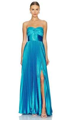 Find AMUR Stef Pleated Gown In Blue on Editorialist. AMUR Stef Pleated Gown in Blue. - size 00 (also in 0, 10, 12, 2, 4, 6) AMUR Stef Pleated Gown in Blue. - size 00 (also in 0, 10, 12, 2, 4, 6) Self: 97% recycled polyester 3% polyester Lining: 100% recycled polyester. Made in China. Dry clean. Partially lined. Hidden back zipper closure. Neckline to hem measures approx 53 in length. UAMR-WD212. 5819647. Between vivid prints and contemporary silhouettes, AMUR (also referred to as A Mindful Use o Senior Dresses, Nola Formal, Prom Dress Inspo, Preppy Prom, Prom Inspo, Pleated Gown, Winter Formal Dresses, Long Formal Dress, Mini Dress Formal