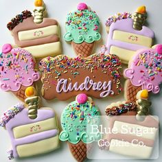 decorated cookies are arranged in the shape of ice cream cones