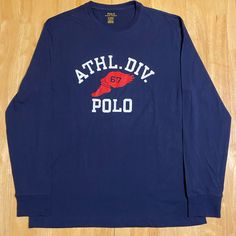 Polo Ralph Lauren Athletic Division Winged Sneaker Graphic Long Sleeve Tee, #67. Navy Blue Colorway, Brand New W/ Tags. Size Medium Message Me With Any Questions Or Offers Blue Ralph Lauren Polo Shirt, Ralph Lauren Graphic T-shirt, Ralph Lauren Fitted Polo T-shirt, Sporty Ralph Lauren Crew Neck T-shirt, Blue Ralph Lauren Crew Neck T-shirt, Ralph Lauren Shirt, Division, Mens Polo, Polo Ralph Lauren