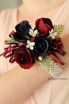 a close up of a person wearing a wrist corsage