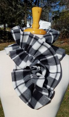 "Classic black and white plaid neck warmer done in my ruffle fleece design. This style is just right to fill in any cold weather neckline while ruffle framing your face.  It is a single wrap, twist and tuck. Made from 100% poly fleece, they are warm and easy care. Machine washable and dryable. Approx. measurement is 6'' wide by 30-36\" ish long: it depends on how much bounce the fabric and elastic have when sewn together. I had lots of fun making these for gifts and they were all happily worn ri Scarf Black And White, Fleece Neck Warmer, Mug Rug Patterns, Black And White Scarf, Wrap Gift, Fleece Scarf, White Scarf