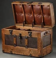 an old fashioned trunk with leather seats