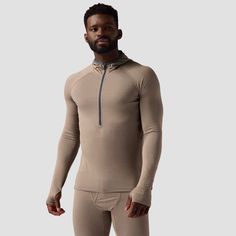 We designed the Backcountry Pines Microgrid Ultralight Scuba Baselayer Top specifically for high-output activities at higher elevations. A part-recycled polyester and spandex blend with a plush microgrid back and smooth face keeps our body temperature regulated, offers moisture-wicking protection, and stretches for optimal freedom of movement during our activity of choice. We also added a half-zip with a tall, Lycra-bound scuba hood to customize coverage depending on the temperature and amount Long Sleeve Compression Activewear, Technical Compressive Activewear For Outdoor Activities, Fitted Technical Activewear For Outdoor Activities, Technical Fitted Activewear For Outdoor Activities, Compressive Technical Activewear For Outdoor Activities, Compressive Technical Activewear For Outdoors, Fitted Half-zip Activewear For Outdoor Activities, Technical Half-zip Activewear For Outdoor, Fitted Moisture-wicking Activewear For Hiking