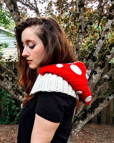 Make an adorable mushroom balaclava with this crochet pattern! Keep cozy and warm on your winter forest hikes...or your trip to the grocery store, because you deserve to dress like a mushroom every dang day. A video tutorial is included for part of this pattern! The link to the video is within the PDF. Read more on our blog! Pattern level: advanced (or ambitious) beginner. Must be comfortable sewing on small pieces and working both in rows and in the round. The trickiest bit is included in the video. You will also need to know how to crochet a dc foundation row, this pattern will not teach you how. Sizes included: one size, fits nearly all teens & adults, however it is extremely easy to adapt this to a larger or smaller size. Materials needed:- super bulky (weight 6) yarn- 5mm and 6mm hook Mushroom Headband Crochet, Mushroom Sweater Pattern, Crochet Mushroom Sweater, Crochet Mushroom Hat Free Pattern, Crocheted Hood, Crochet Mushroom Hat, Crochet Pattern Mushroom, Hood Crochet Pattern, Hood Crochet