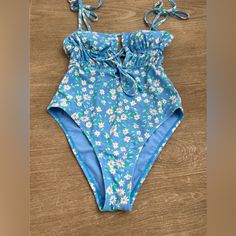 Never Worn, No Flaws, Size Small Blue Summer Bodysuit For Sunbathing, Summer Light Blue Bodysuit For Poolside, Blue Beachy Bodysuit For Beach Party, Beachy Blue One-piece Bodysuit, Light Blue Beachwear Bodysuit For Summer, Beachy Blue Bodysuit For Beach Party, Blue Beachy Bodysuit For Summer, Blue Summer Bodysuit For Vacation, Blue Summer Bodysuit For Beach Party