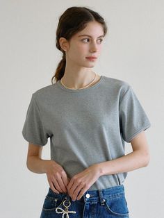 Basic t-shirts that made of soft ribbed cotton-span blended fabric. Featuring the relaxed silhouette, rounded neckline, and comfortable fit. The taping detail at neckline and sleeve hem elevated the quality. Style with various bottoms like denim jeans, trousers, and skirts to create daily looks. - Rounded neckline and short-sleeved design- Taping detail at neckline and sleeve hems- Relaxed and standard silhouette- Soft cotton-span blended fabric made Gray Cotton Top With Ribbed Neckline, Basic Gray T-shirt For Everyday, Gray Relaxed Fit Tops For Everyday, Simple Gray Everyday Tops, Simple Everyday Gray Tops, Basic Gray Tops For Everyday, Basic T Shirts, K Fashion, Urban Lifestyle