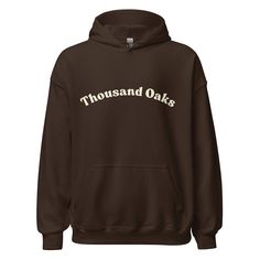 Introducing the Thousand Oaks Hoodie - a classic, minimalist design that speaks volumes. Crafted for comfort with premium materials, it's your new everyday essential. Let the name itself evoke the charm of this picturesque locale. Simple, understated, and effortlessly stylish. * 50% pre-shrunk cotton, 50% polyester * Fabric weight: 8.0 oz/yd² (271.25 g/m²) * Air-jet spun yarn with a soft feel and reduced pilling * Double-lined hood with matching drawcord * Quarter-turned body to avoid crease down the middle * 1 × 1 athletic rib-knit cuffs and waistband with spandex * Front pouch pocket * Double-needle stitched collar, shoulders, armholes, cuffs, and hem * Blank product sourced from Bangladesh, Nicaragua, Honduras or El Salvador This product is made especially for you as soon as you place a College Cotton Hoodie With Branding, College Winter Sweatshirt With Branding, College Branding Winter Sweatshirt, Fall Hoodie With Branding And Relaxed Fit, Branded Relaxed Fit Hoodie For Fall, Fall Hoodie With Branding, Hooded Fall Sweatshirt With Branding, Girl Hoodie, Valley Girl