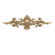 an ornate gold wall decoration with hearts and scrolls on the top, in front of a white background