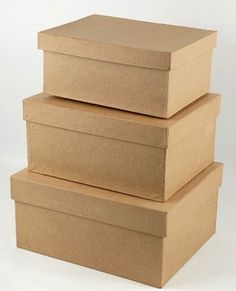 three cardboard boxes stacked on top of each other