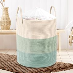 a large round basket sitting on top of a rug